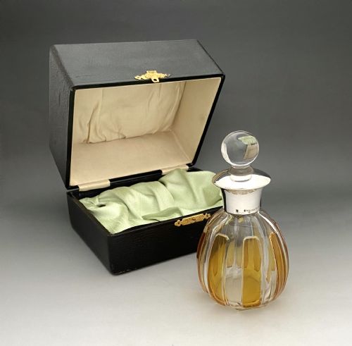 An Attractive Silver Mounted Cologne/ Perfume Bottle in Original Box