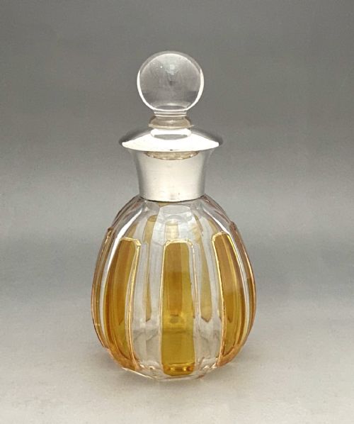 fig 1. An attractive silver mounted cologne/ perfume bottle in original box