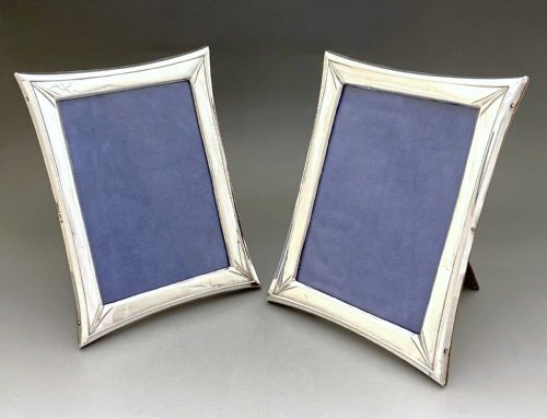 An Elegant Matching Pair of Silver Photo Frames