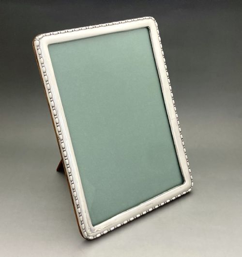 A Charming George V Silver Photo Frame