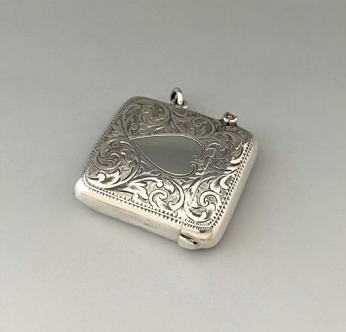 fig 1. A charming Edwardian silver vesta with heart shaped cartouche