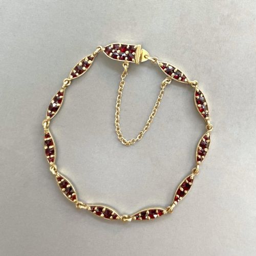fig 1. An elegant mid century silver gilt & Garnet bracelet