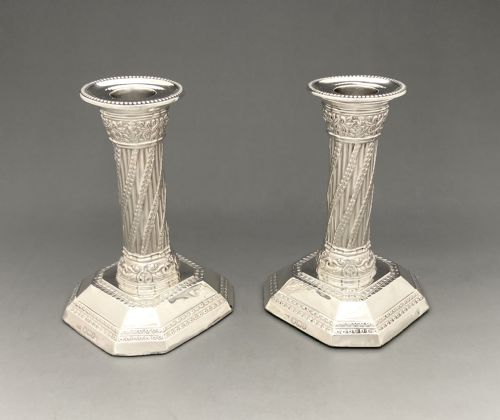 An Attractive Pair of Victorian Silver Corinthian Column Candlesticks