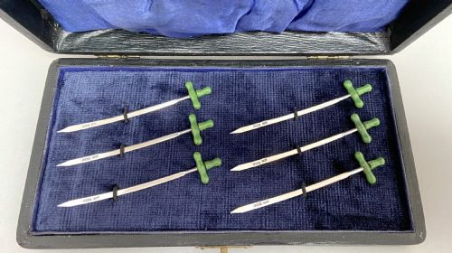 fig 1. A rare & unusual boxed set of 6 hallmarked silver cocktail sticks