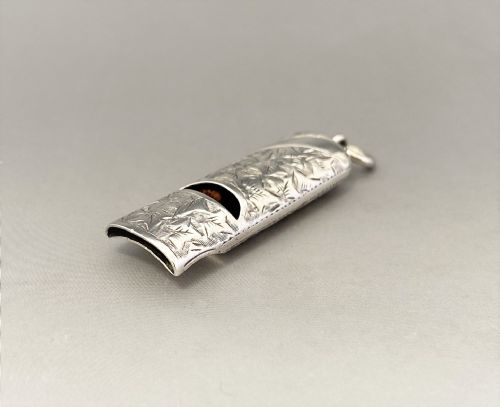fig 1. A delightful Victorian silver dog whistle