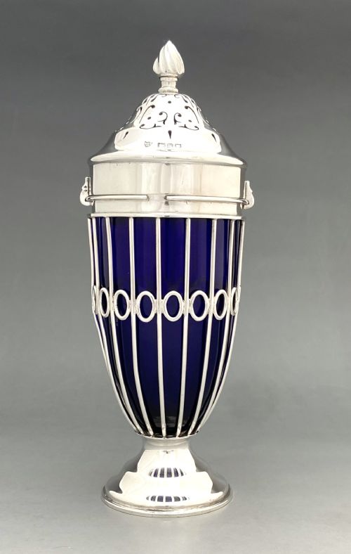 fig 1. An elegant Edwardian silver wirework sugar caster