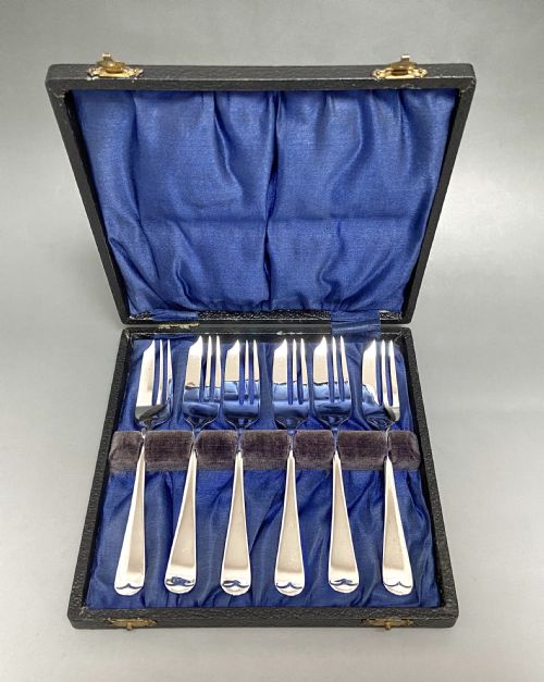 fig 1. An excellent boxed set of 6 silver cake forks