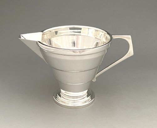 A Stylish Art Deco Silver Cream Jug