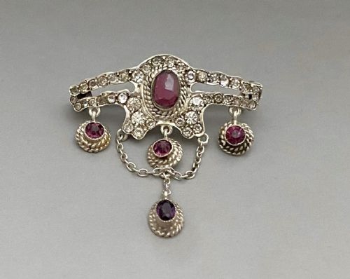 fig 1. An attractive silver & garnet drop brooch