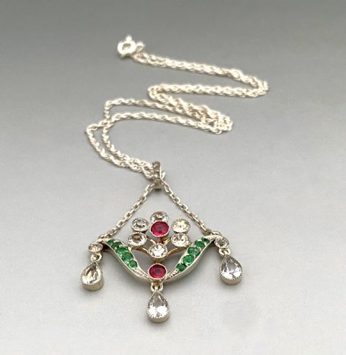 fig 1. An elegant early 20th Century silver necklace pendant