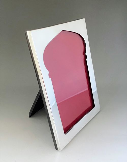 fig 1. An attractive silver photo frame of unusual design