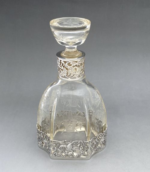 An Exquisite Dutch Silver Mounted Perfume/ Cologne Bottle