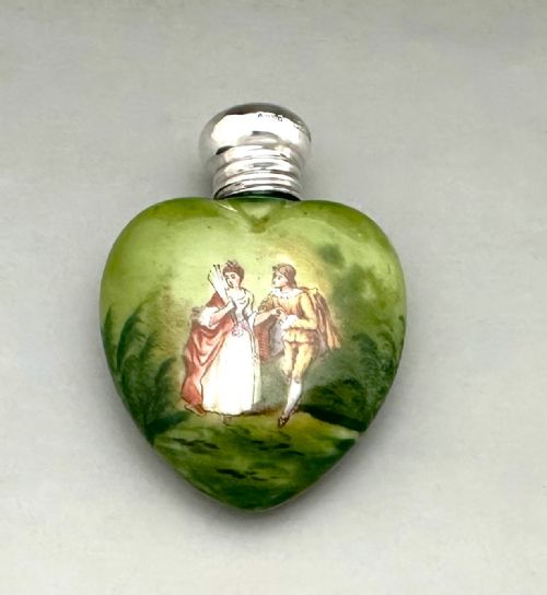 An Edwardian Heart Shaped Silver Mounted Scent Bottle