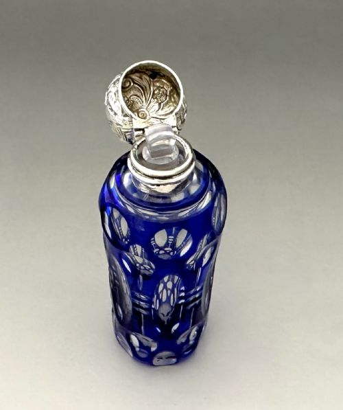 fig 1. An attractive Victorian silver mounted cut through scent bottle