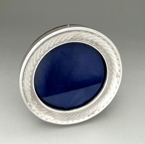 fig 1. A stylish engine turned silver photo frame