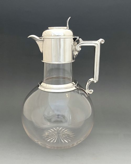 A Fabulous Late Victorian Silver Mounted Claret Jug