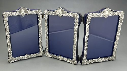 A Superb Victorian Silver Triple Photo Frame