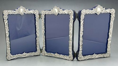 fig 1. A superb Victorian silver triple photo frame