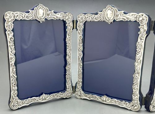 fig 2. A superb Victorian silver triple photo frame