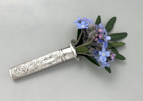 fig 1. A delightful George V silver buttonhole/ lapel flower holder