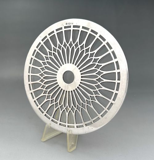 fig 1. A stylish silver mounted teapot stand/coaster