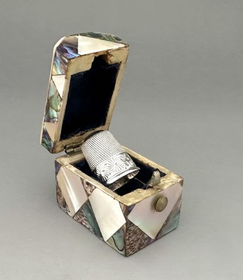 A Delightful Victorian Mother-of-pearl Thimble Box & Silver Thimble