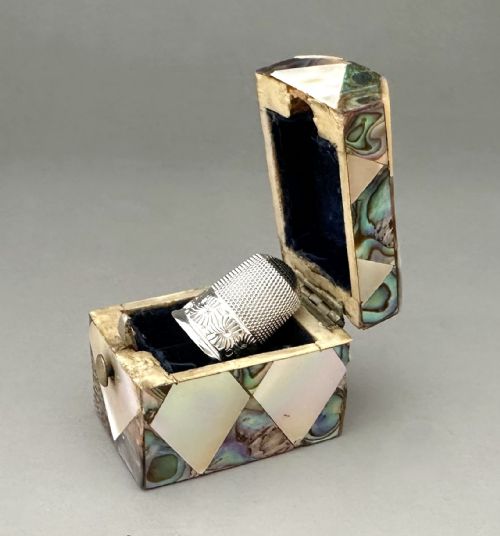 fig 1. A delightful Victorian mother-of-pearl thimble box & silver thimble