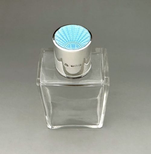 An Art Deco Silver & Guilloche Enamel Cologne Bottle