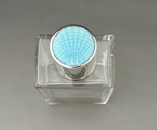fig 1. An Art Deco Silver & Guilloche Enamel Cologne Bottle