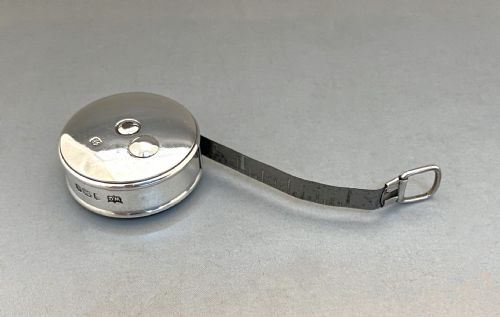 A Superb Victorian Silver Cased Tape Measure