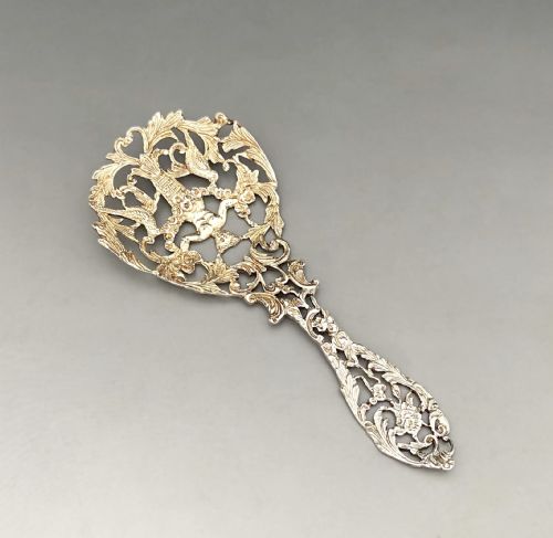 A lovely William Comyns Victorian cast silver bonbon spoon