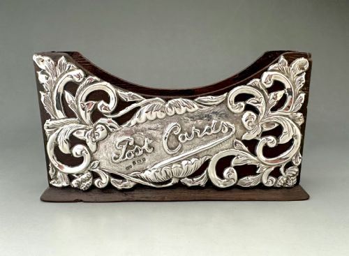 A CHARMING EDWARDIAN SILVER MOUNTED LETTER HOLDER