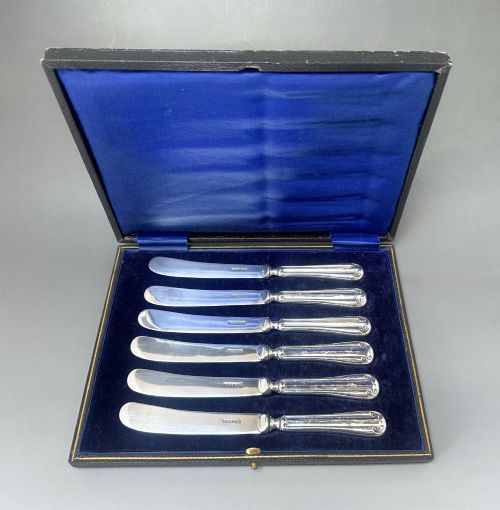 A Useful Set of 6 Boxed Silver Handled Butter Knives