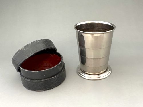 A charming silver plated collapsible Stirrup cup