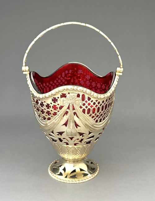 A Stunning Silver Gilt Basket with Cranberry Glass Liner