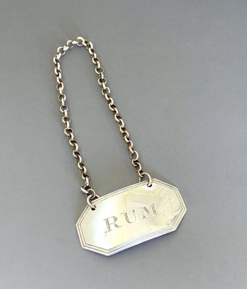 A Silver Rum Decanter Label by Female Silversmith - Elizabeth Morley
