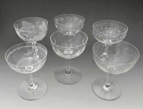 A Charming Harlequin Set of 6 Antique Champagne Glasses