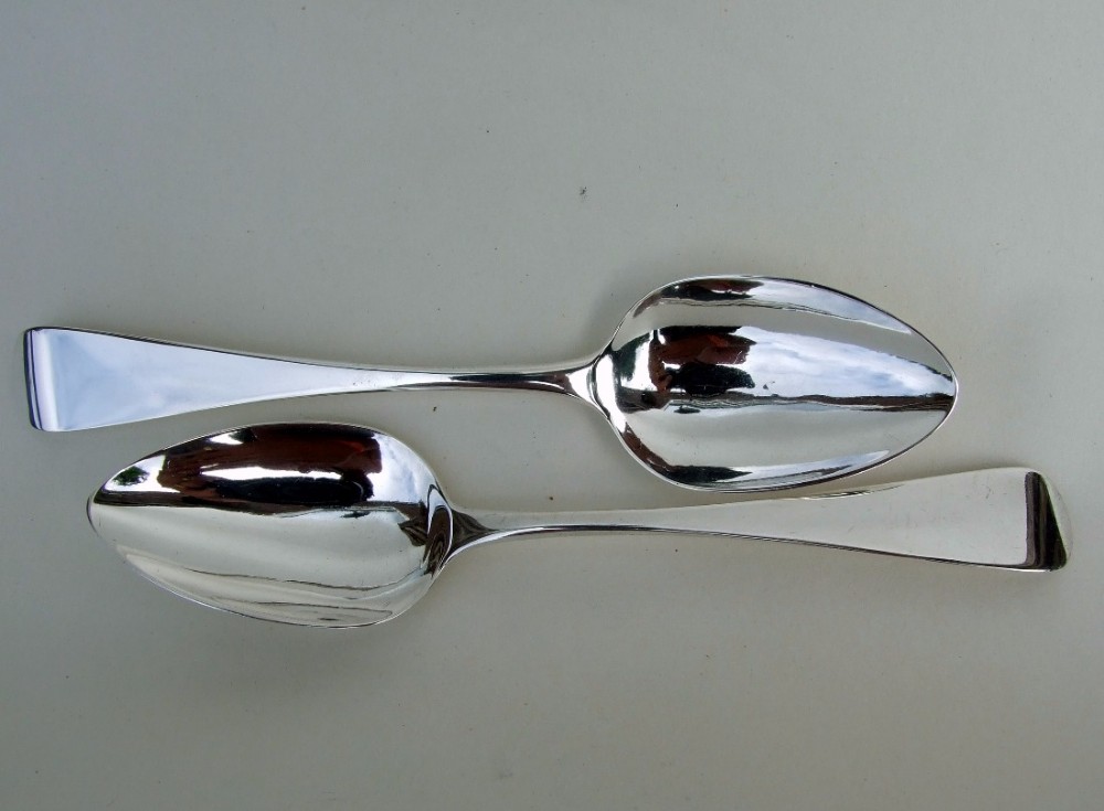 A rare pair of Exeter silver Victorian dessert spoons.