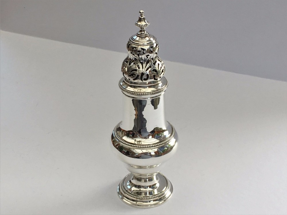 Magnificent George III silver sugar caster 