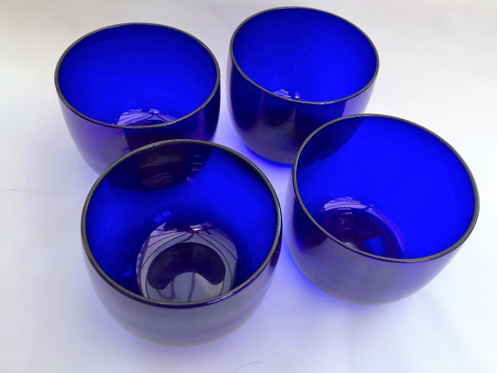 An unusual set of four Bristol blue Victorian finger bowls