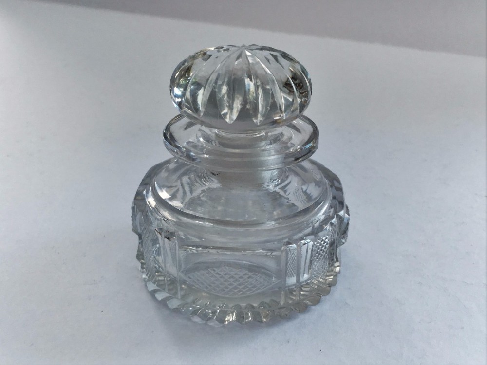 A Mid Victorian cut glass ink bottle