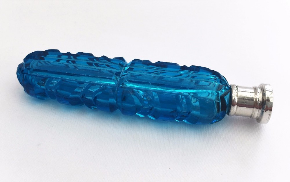 A Stunning Victorian petrol blue cut glass perfume with silver lid