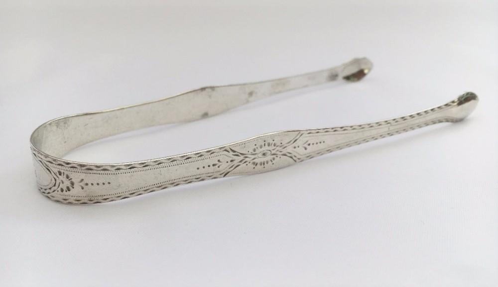 A pair of Hester Bateman silver sugar tongs.