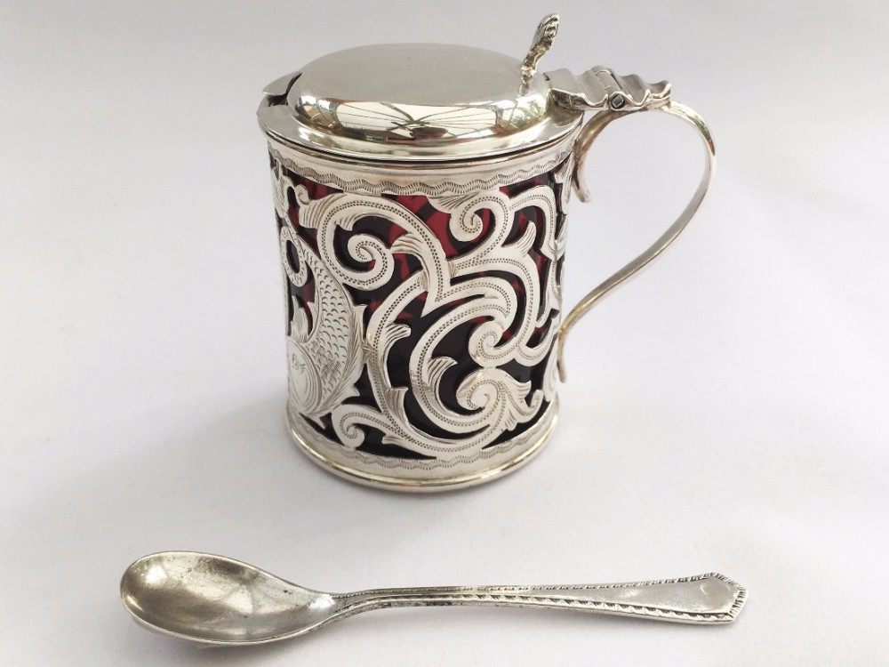 A superb Edwardian silver & cranberry mustard pot with spoon.