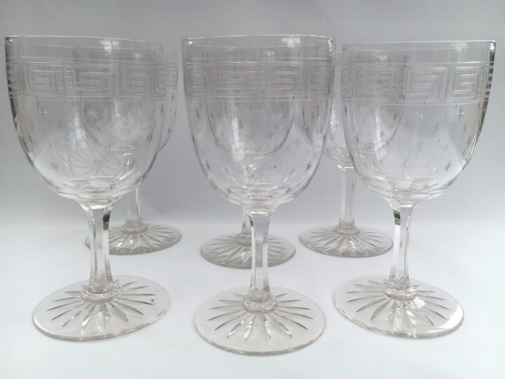 A fine set of six late victorian star etched wine glasses