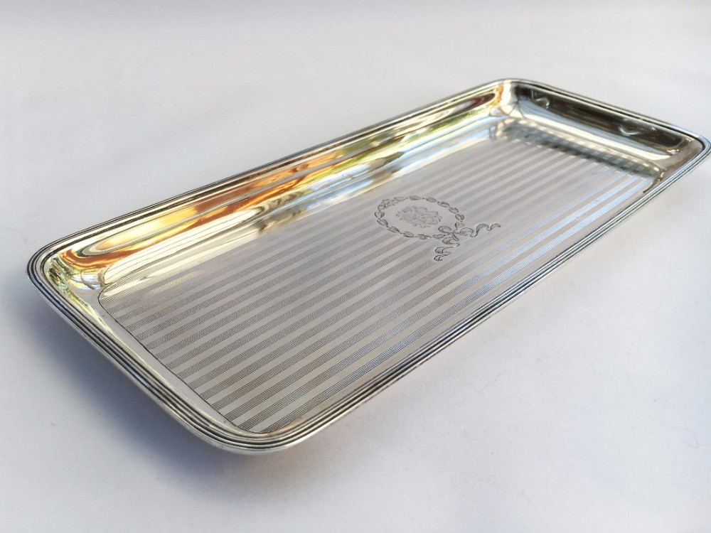 A handsome engine turned silver pen tray