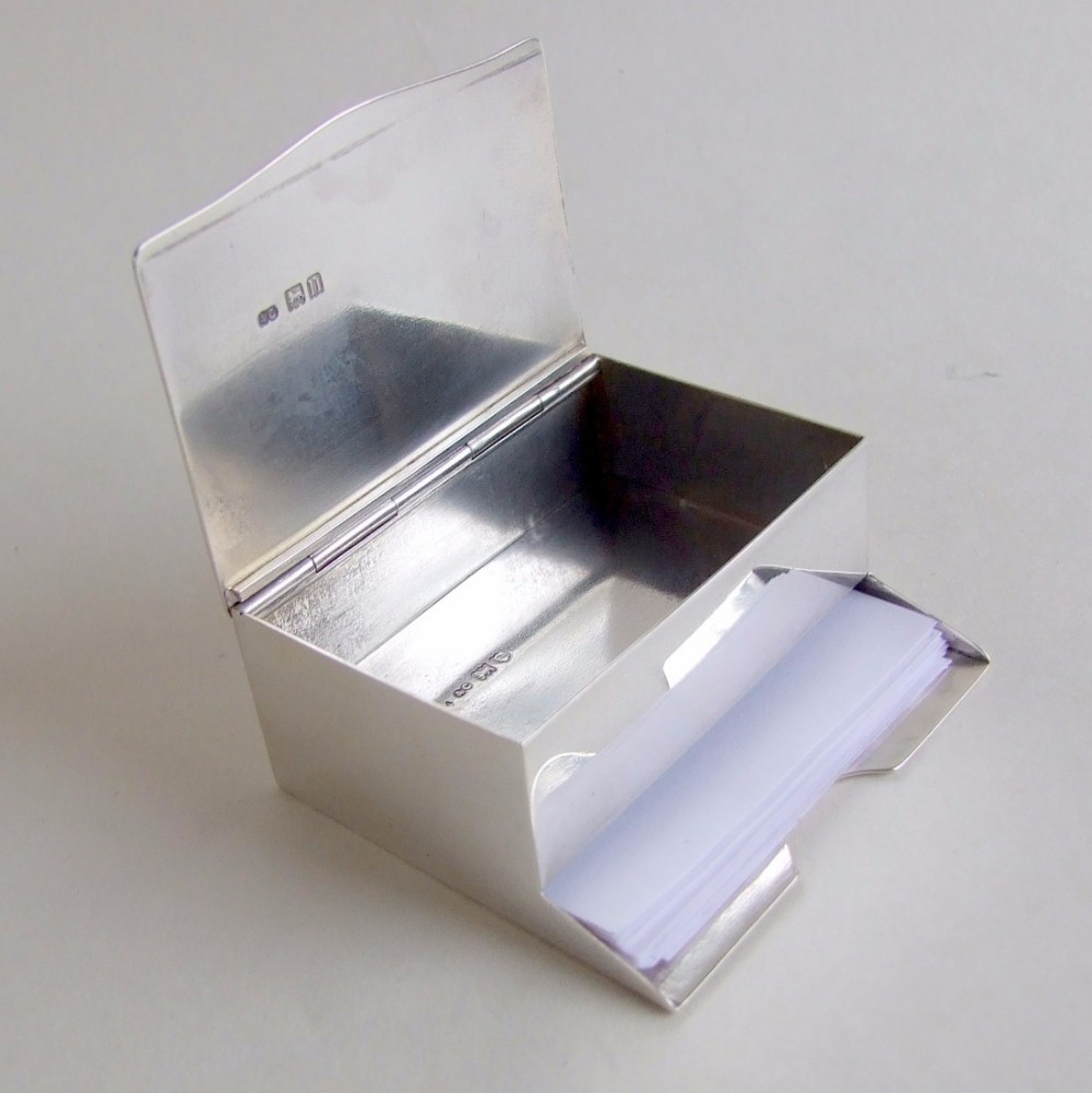 A superb small silver Edwardian desk tidy.