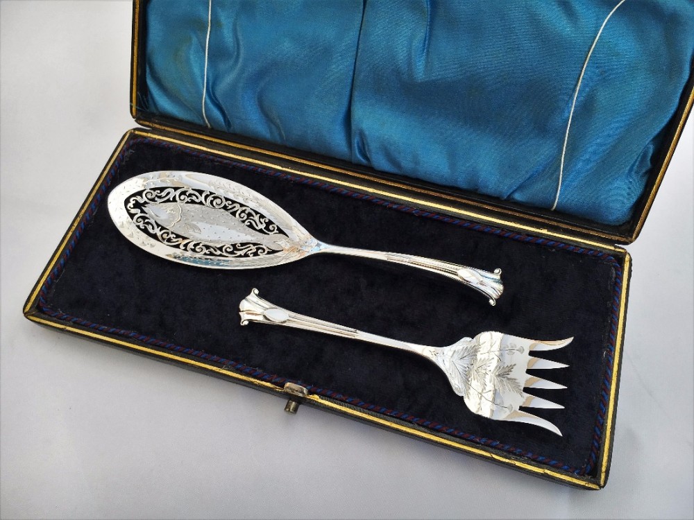 A wonderful boxed pair of silver Onslow pattern sardine servers.