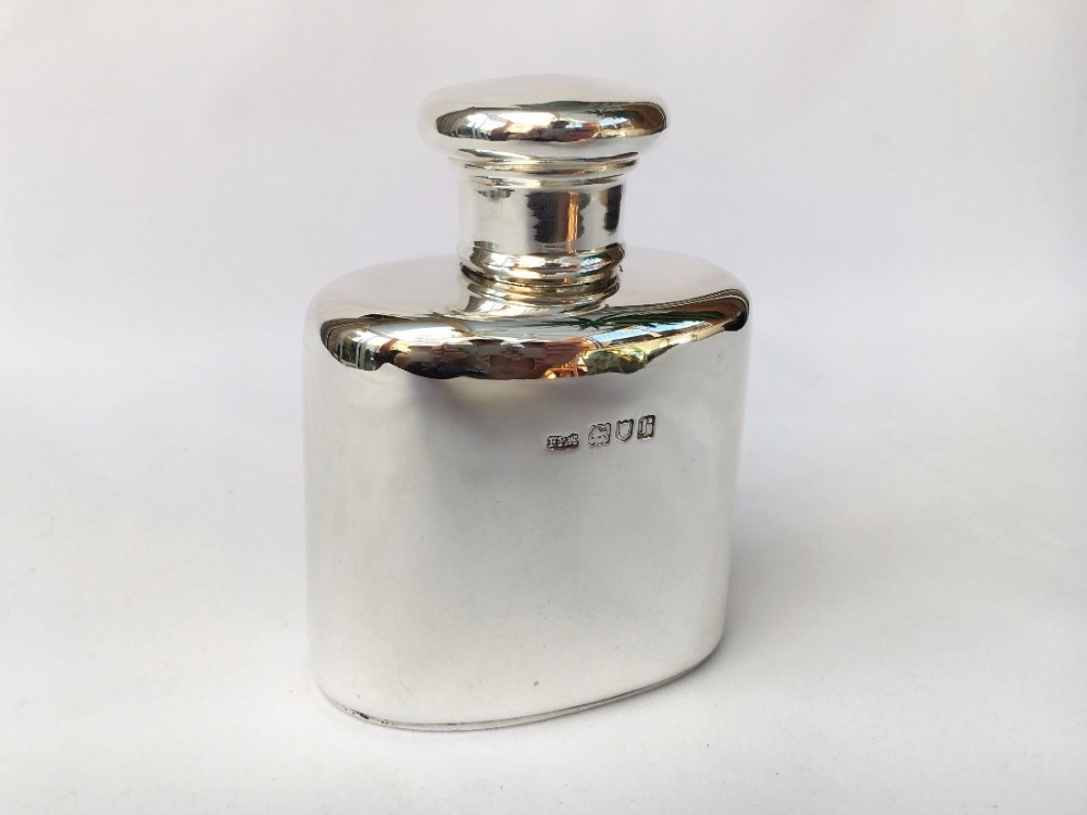 A stylish George V silver Gentleman's cologne bottle.