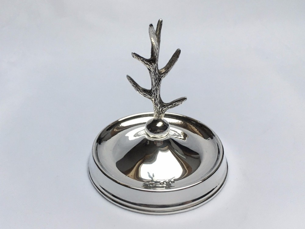 An attractive George V silver ring tree.